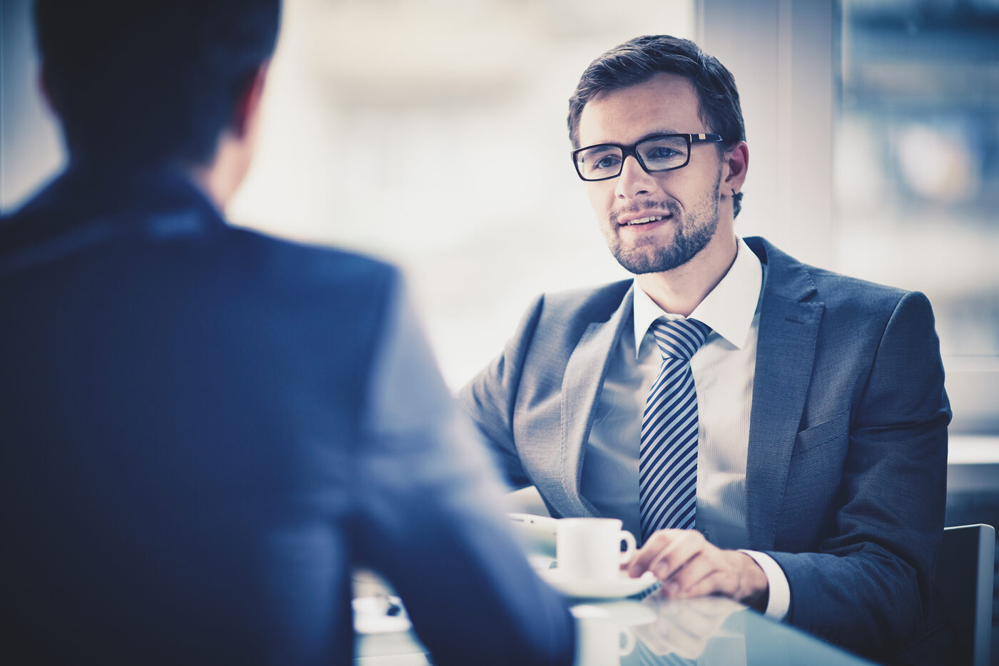 A 20-minute conversation between two colleagues over coffee, not a sales pitch